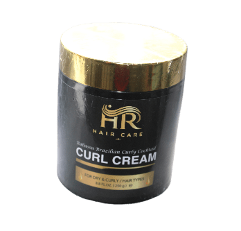 Crème coiffante pour cheveux secs et bouclés, enrichie en huile de babassu, idéale pour hydrater et définir les boucles.