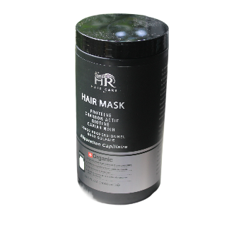 Masque capillaire réparateur HR Hair Care by Hair Réunion dans un pot noir élégant, enrichi en biotine, collagène, caviar noir, charbon actif et huile d’argan, soin professionnel qui renforce, nourrit et redonne du volume aux cheveux abîmés ou fins.